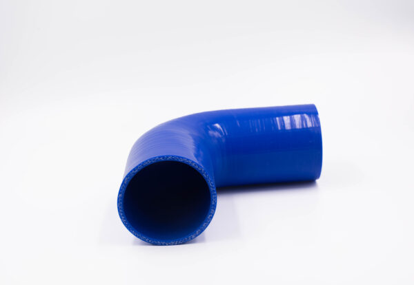 Image of a 90-degree hose, featuring a right-angle bend in its design for specific fluid or air flow applications.